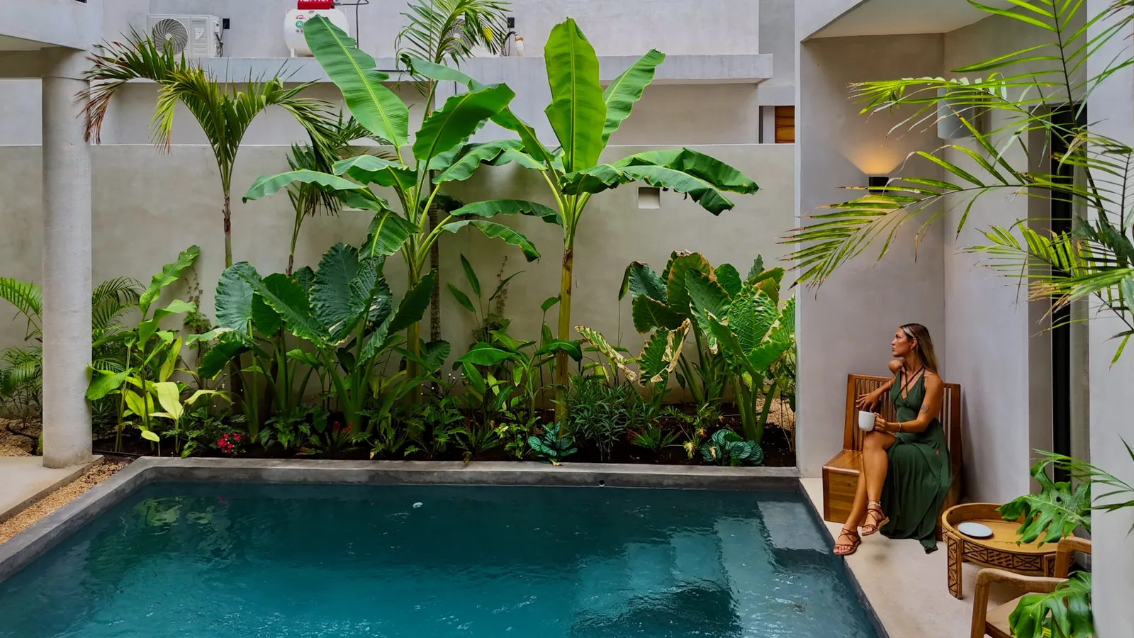 Courtyard pool framed by tropical plants at Villa Aniana in La Veleta, Tulum